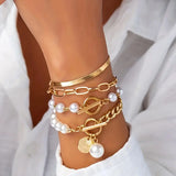 Chic Gold 4-Piece Bracelet Set β Snake, Pearls & Links | Gold