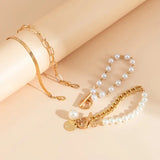 Chic Gold 4-Piece Bracelet Set β Snake, Pearls & Links | Gold