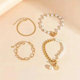 Chic Gold 4-Piece Bracelet Set β Snake, Pearls & Links | Gold